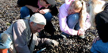 Community members work together outdoors
