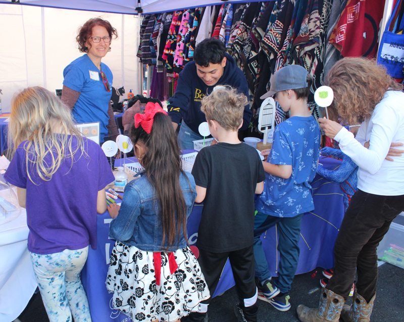 A Lawrence On-The-Go staff is working with youth in the community