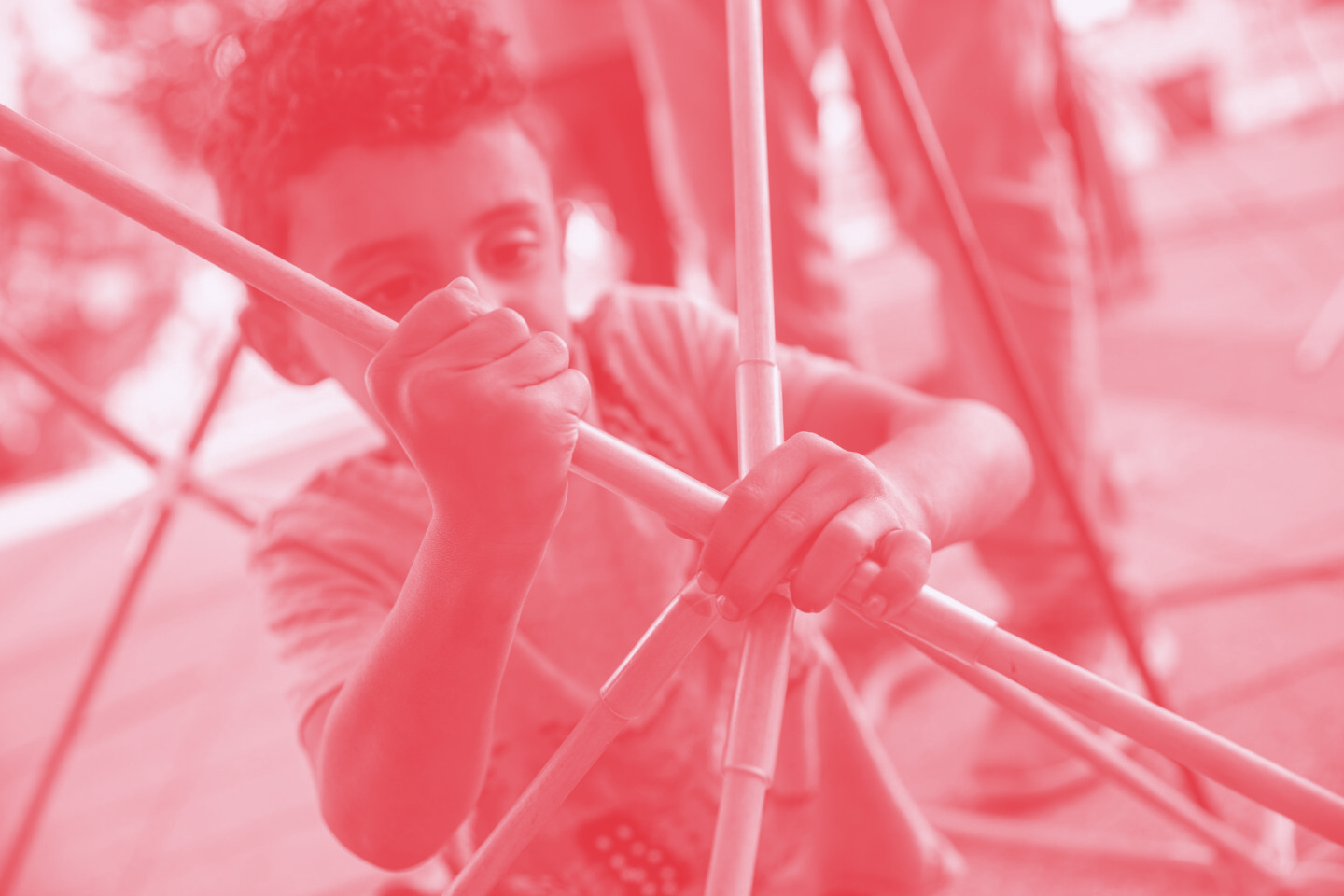 A young person is building a structure at The Lawrence.